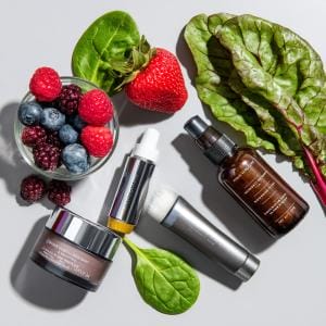 Fruits, vegetables, and skincare products on display.